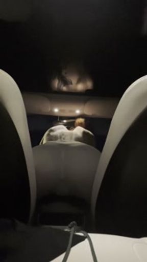 tattooed horny girl in leggings touching herself in her car