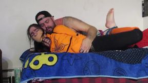gagged woman in brown got hogtied in bed