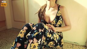 Pretty woman masturbates on camera in a dress and brings herself to a loud orgasm with her fingers.
