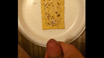 Jerking off and cumming on food then eating my own cum