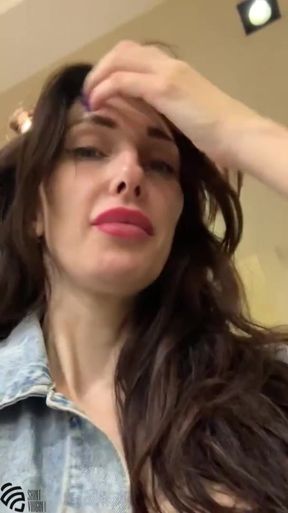 Hot MILF Masturbates in the Fitting Room of the Store