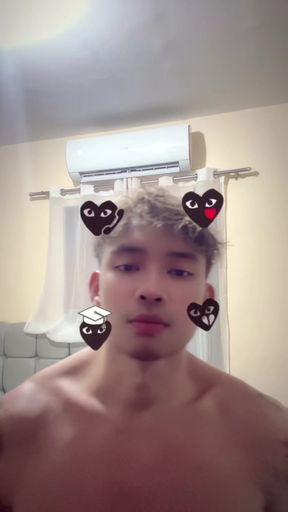 Man with black hair in a bathroom