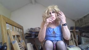 Femboi fag slut Sarah smokes and poses in a black latex dress, then removes it to show off her lingerie