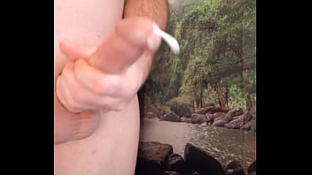 Justin Mikels jerking off by the river