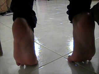 Nazarena Has A Slave For Her Stockings and Feet
