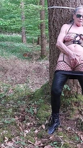 Granny Is Masturbating in the Woods!