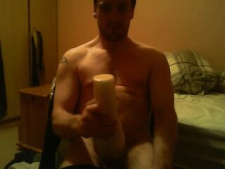 Sitting on chair watching porn banging a felsh light untill I ejaculate