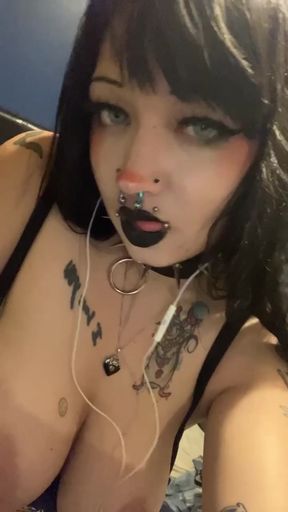 Pierced lips and tattoos