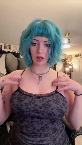 Goth babe shows off her big boobs and ass