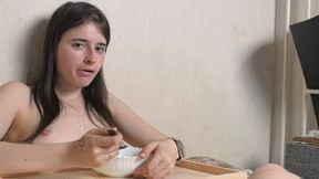 A woman eats and a man watches and jerks off