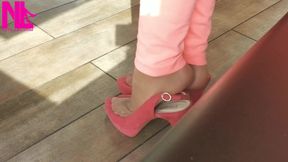 Shoeplay with High Heels in a Bar