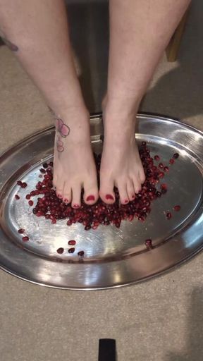 Watch my perfect feet play with pomegranate seeds