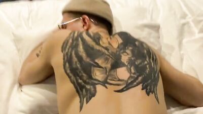 Tattooed gay bloke gets fucked in a doggystyle by his boyfriend