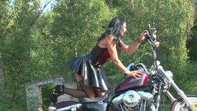 Fabulous brunette enjoys posing outdoors