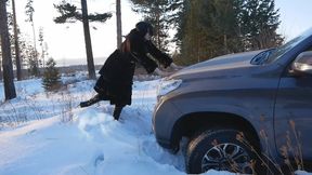 Long-legged hottie drives in the snow and gets her car stuck | Pedal pumping