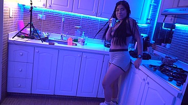 Dancing at the kitchen on a streptease