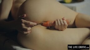 Lonely insane hottie with nice tits masturbates to orgasm with a carrot