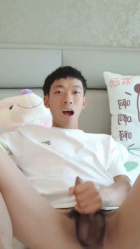Cute Asian boy dorm bed with teddy bear masturbating moaning cum and eating cum   Clip 1