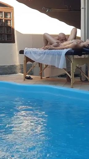 Massage in the pool. The therapist couldn't hold back and made her cum in his mouth.   Clip 3