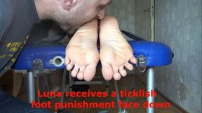 Luna receives a ticklish foot punishment face down