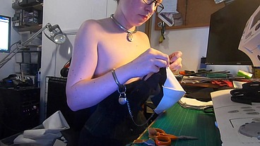 Dutifully working away sewing face masks while plugged and corseted, with a tight hobble skirt on and my wrists chained toget...