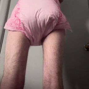 Messing around in pink diaper