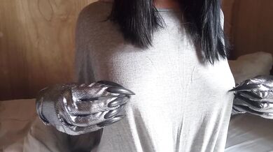 Gauntlet gloves tease nipples to explosive climax beyond normal