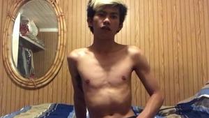 TXXXMStudios.com: Asian Xander Ridge masturbating in the bed