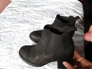 Cumming on her ankle boots