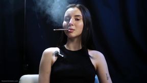 Elegant Brunette Smoking in Black Outfit