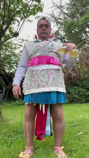 In gardener outfit to take a piss shower with bottles