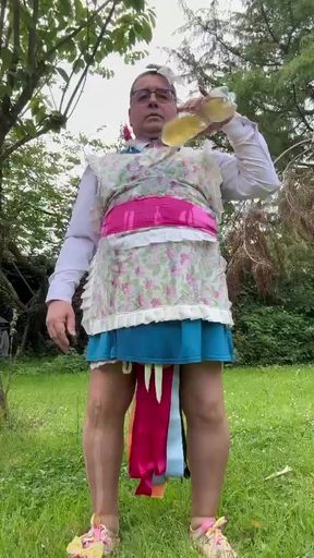 In gardener outfit to take a piss shower with bottles