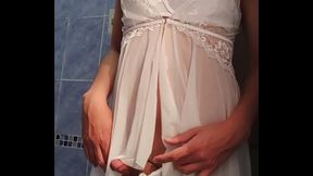 Femboy cums hands free using angelical clothes