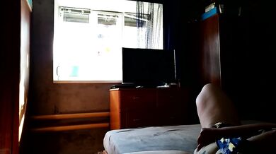 Milf fucks herself for window cleaner