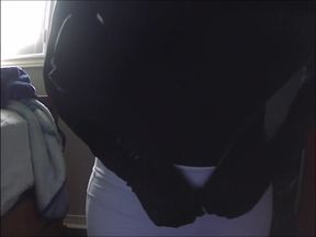 Tight corset squeezing fat tits while rubber masked bimbo teases butt in white yoga pants