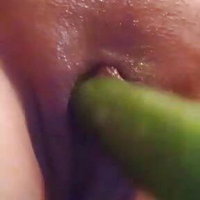 Cucumber inside pussy