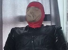 Hubert Kate dressed in full latex doing solo breath play