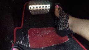 Hot pink toes high arches in black sandals PEDAL PUMPING