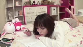 Asian teen masturbates