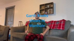 Garth Rooks shows his manhole