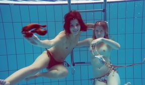 Two pale skin and sexy Russian teens in the pool get topless