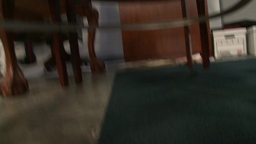 She's an okay secretary but she really shines after hours when she gets down on her knees...