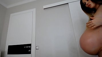 Nine mounth pregnant beauty is home alone