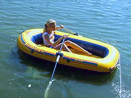 Debbie masturbating in a rubber boat