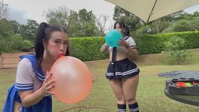 Blowing up balloons in sailor outfits