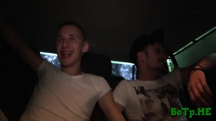 Gays tease each other in a car