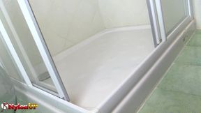 Irina Vega masturbates in the shower wearing nylons