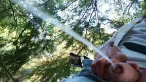 Peeing in the Park Behind a Tree