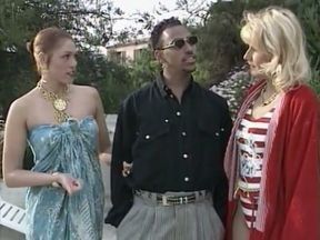 Outdoors threesome action with two stunning babes