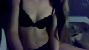 Blonde bombshell in sexy black lingerie teasing me on webcam